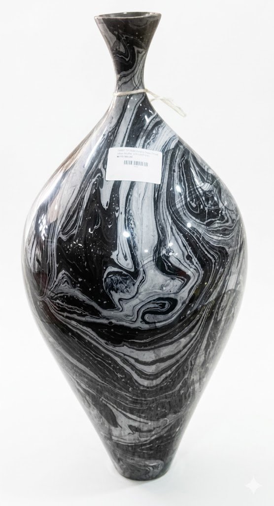 Large black and white hand-blown glass floor vase with abstract marble swirl pattern for home decor in Lagos, Nigeria