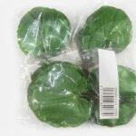 Vibrant green artificial Begonia Bolsa leaf stems in a protective bag for floral décor in Lagos, Nigeria