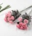 Vibrant hot pink and black mini water lily artificial flower bouquet for elegant home decor in Lagos, Nigeria.