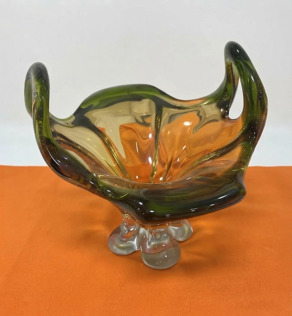 Handcrafted green, orange, and white glass planter Handcrafted green, orange, and white glass planter for luxury indoor plant display in Lagos, Nigeria