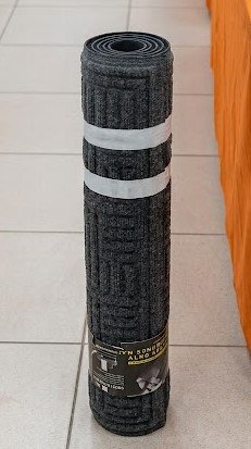 Heavy duty entrance mat commercial grade with non-slip backing for high traffic doorways in Lagos, Nigeria.