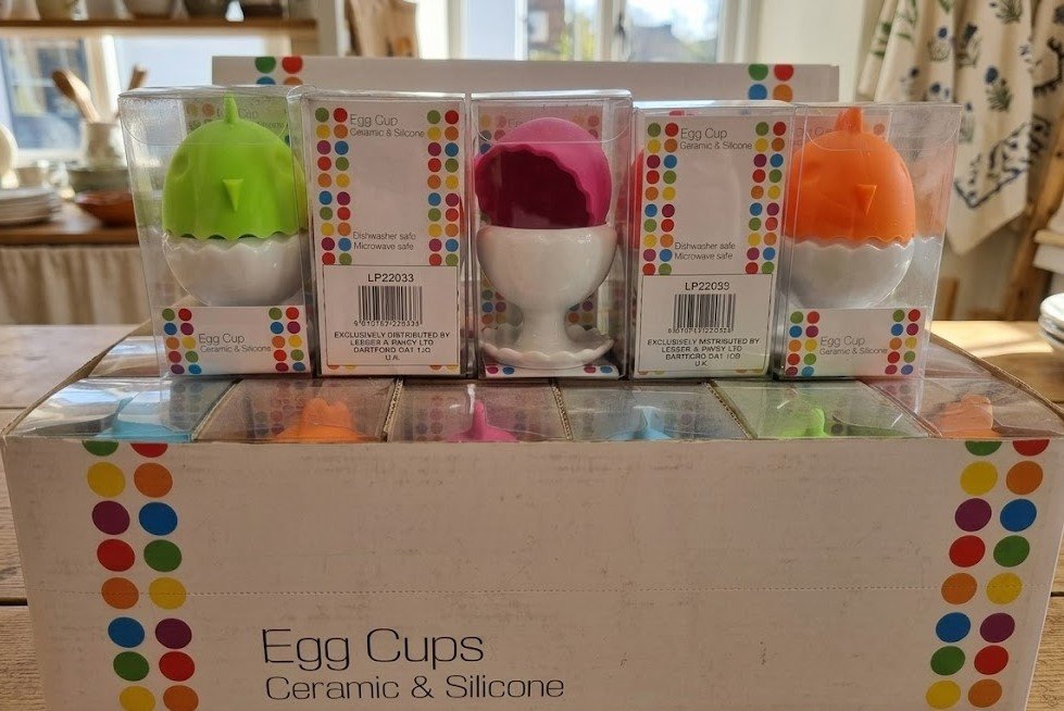 Egg cup holder with silicone lid for soft-boiled eggs, covered breakfast serving cup for kitchen use in Lagos
