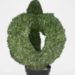 Artificial outdoor topiary flower ball in pot for garden and entrance décor in Lagos, Nigeria