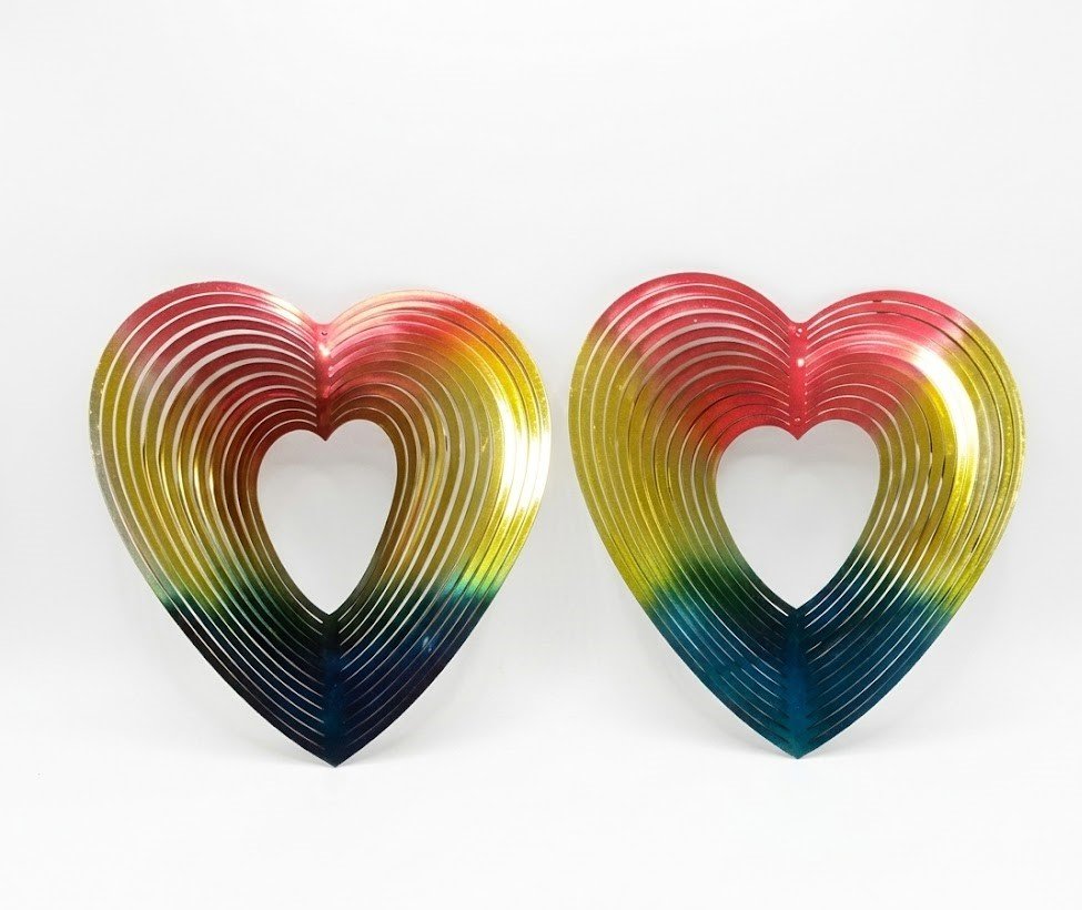 Two 3D multicolor heart wind spinners in red, yellow, and blue for hanging room decoration in Lagos, Nigeria
