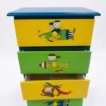 Modern wooden children's chest of drawers with white finish and large storage units in Lagos, Nigeria