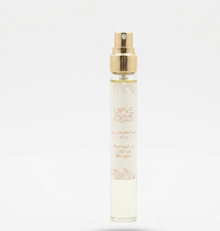 Slim glass 10ml bottle of Love Eau De Parfum with gold cap in Lagos, Nigeria