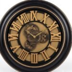 Large black and gold industrial steampunk wall clock with visible moving gears and Roman numerals in Lagos, Nigeria