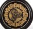 Large black and gold industrial steampunk wall clock with visible moving gears and Roman numerals in Lagos, Nigeria