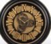 Large black and gold industrial steampunk wall clock with visible moving gears and Roman numerals in Lagos, Nigeria