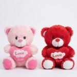 Soft red and pink plush teddy bears holding "Love You" hearts for gift giving in Lagos, Nigeria