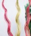 Tall bundles of pink and yellow spiral curly willow twigs for floor vase home decoration in Lagos, Nigeria