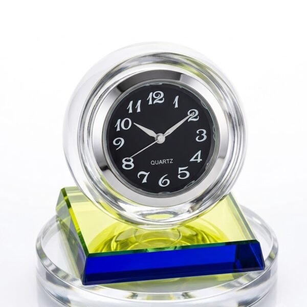 Crystal ball table clock with a black face and white numerals on a tiered multi-colour glass base in Lagos, Nigeria.