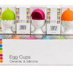 Egg cup holder with silicone lid for soft-boiled eggs, covered breakfast serving cup for kitchen use in Lagos