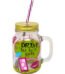 Glass drinking jar with "Drink 'til he's Cute" text, gold lid, and purple striped straw in Lagos, Nigeria