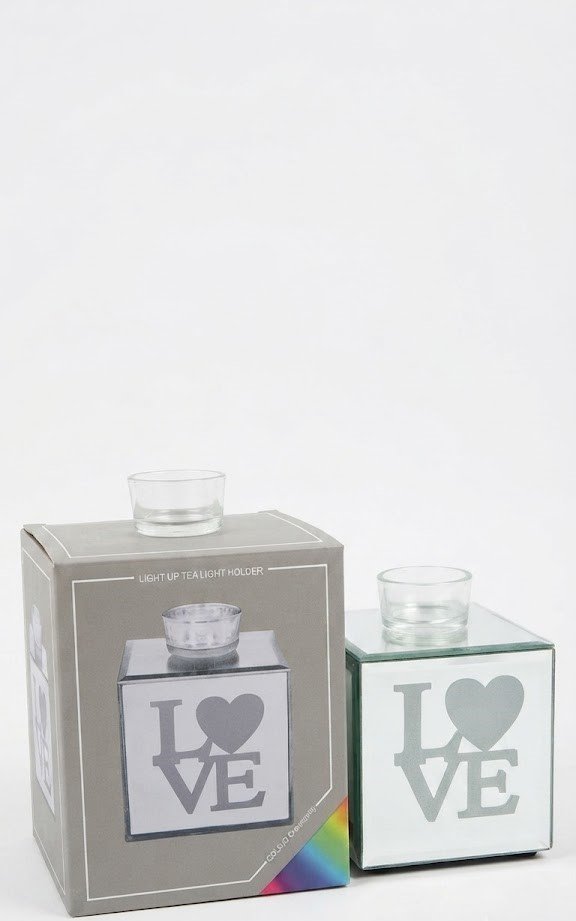Mirror glass LED tealight Mirror glass LED tealight with "Love" heart design for romantic home decor and gifting in Lagos, Nigeria