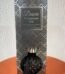 Charcoal round faceted glass Desire Pomegranate Noir reed diffuser with black reeds, Lagos, Nigeria