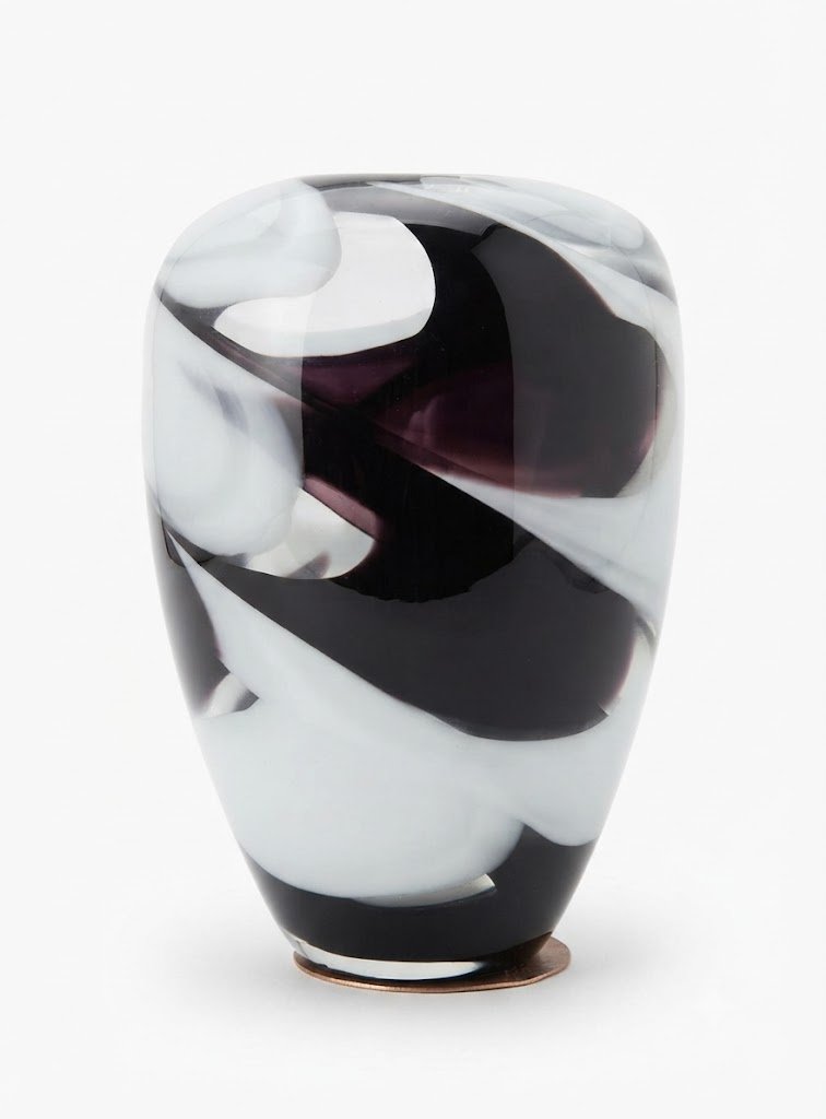 Large hand blown glass Liquorice vase with abstract black and white swirl patterns in Lagos, Nigeria