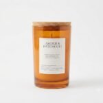 Large 15cm amber and patchouli scented glass jar candle with a cork lid for home decor in Lagos, Nigeria