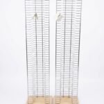 Sleek floorstanding DVD storage rack with a light wood base for home media organization in Lagos, Nigeria.