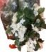 Cream artificial rose and gypsophila floral garland with green leaves for home decor in Lagos, Nigeria