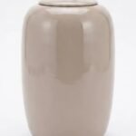 Shiny taupe 45.5cm ceramic jar with a decorative silver bird lid for luxury home styling in Lagos, Nigeria