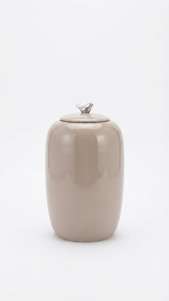 Shiny taupe 45.5cm ceramic jar Shiny taupe 45.5cm ceramic jar with a decorative silver bird lid for luxury home styling in Lagos, Nigeria