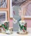Ceramic reed diffuser with Cattleya orchid and ylang ylang scent, elegant home fragrance decor in Lagos Nigeria