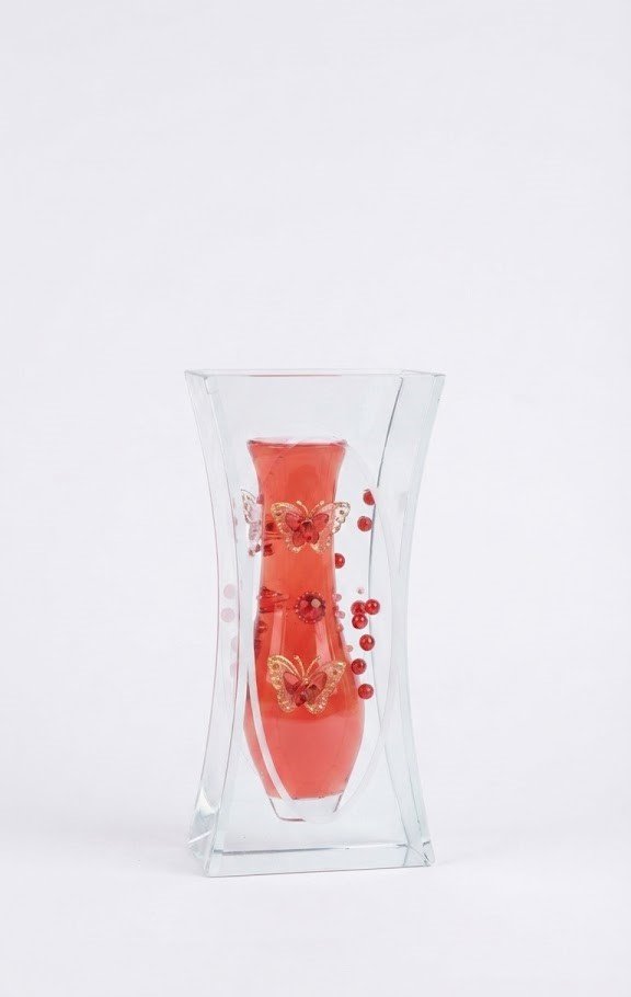 Red 25cm glass vase with decorative textured finish Red 25cm glass vase with decorative textured finish for home and office floral décor in Lagos, Nigeria