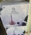Wooden 350ml aroma atomiser with a tall neck and leaf-patterned light detailing in a luxury gift box in Lagos, Nigeria.