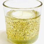 Led Gel Candle With Light Up Gold Stars Scented Amber Noir