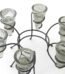 Clear glass cylindrical pillar candle holder featuring a sleek black metal ring base, Lagos, Nigeria