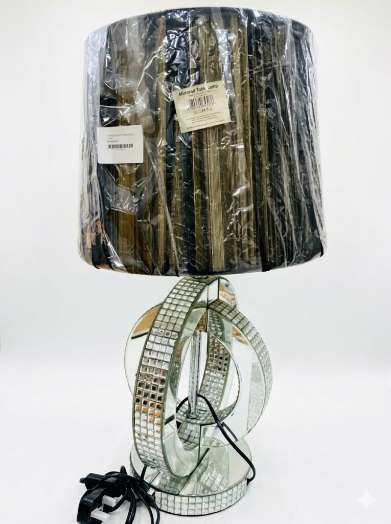 Elegant mirrored glass table lamp with a silver finish and crystal accents for luxury home lighting in Lagos, Nigeria