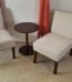 3-piece beige bistro set with two accent chairs and matching table for balcony or patio seating in Lagos home décor