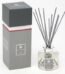 Purcell and Woodcock sea salt driftwood diffuser with glass bottle and reeds on table Lagos Nigeria