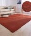 Vibrant red casual living area rug with a soft texture for home and office floor décor in Lagos, Nigeria