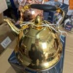 Polished gold 3.0L Bekker stainless steel whistling kettle with black handle and lid in Lagos, Nigeria