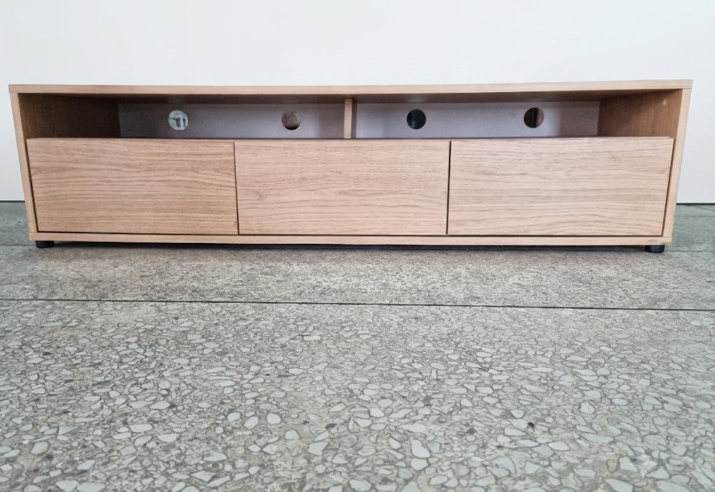Wooden TV unit with storage shelves and modern design for living room setup in Lagos, Nigeria
