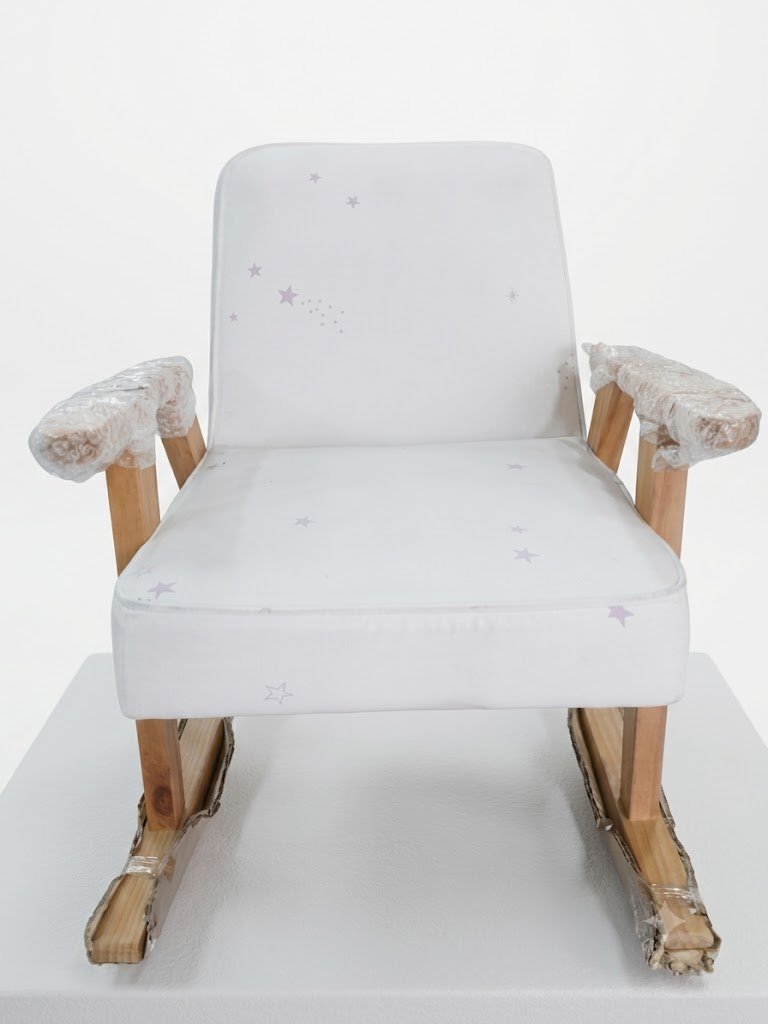 Baby rocking chair with gentle motion for nursery comfort and relaxation in Lagos, Nigeria