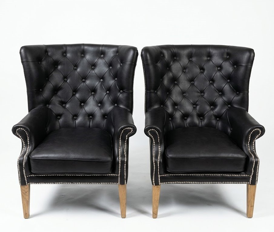 Sleek black two-seater upholstered loveseat for modern living room décor in Lagos, Nigeria