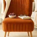 Burnt orange accent chair with cushioned seat for living room décor in Lagos, Nigeria