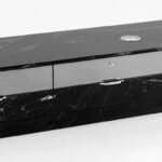 Luxury TV stand with a white marble top and gold accents for a modern living room setup in Lagos, Nigeria