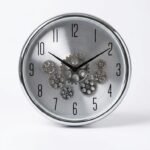 Silver Enarose wall clock with visible moving gears and black Arabic numerals for modern decor in Lagos, Nigeria.
