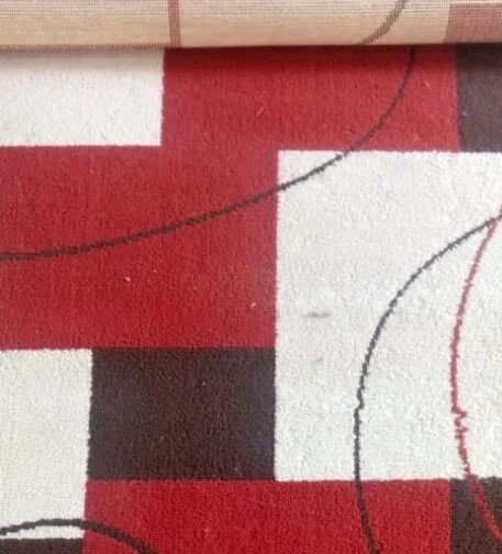 Red and black modern geometric patterned area rug with 3x6 ft dimensions for home and office floor décor in Lagos, Nigeria