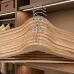 10-pack of smooth natural wooden clothes hangers for closet organization in Lagos, Nigeria