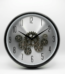 Silver and black Enarose wall clock with exposed rotating gears and Arabic numerals for home decor in Lagos, Nigeria.