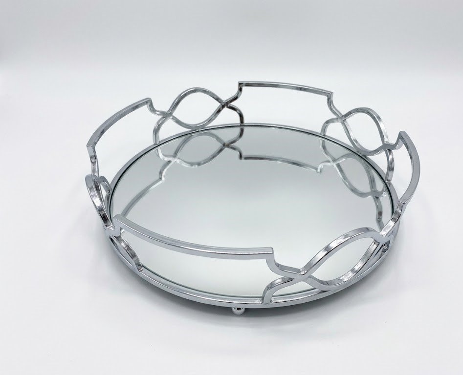 Silver round 21cm mirrored tray with an abstract Art Deco-style wire rim for displaying perfume and candles in Lagos