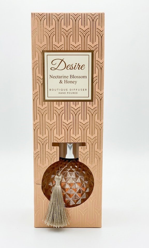 Rose gold round diamond-textured glass Desire Nectarine Blossom & Honey reed diffuser with tassel, Lagos, Nigeria