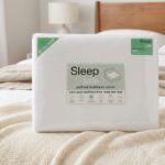 White quilted king bed mattress cover with fitted skirt for bedroom comfort in Lagos, Nigeria