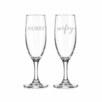Pair of elegant Hubby and Wifey champagne glass flutes for weddings and anniversaries in Lagos, Nigeria