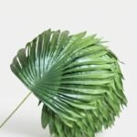 Vibrant green 45cm artificial fan palm leaf with realistic ridged texture for tropical home décor in Lagos, Nigeria